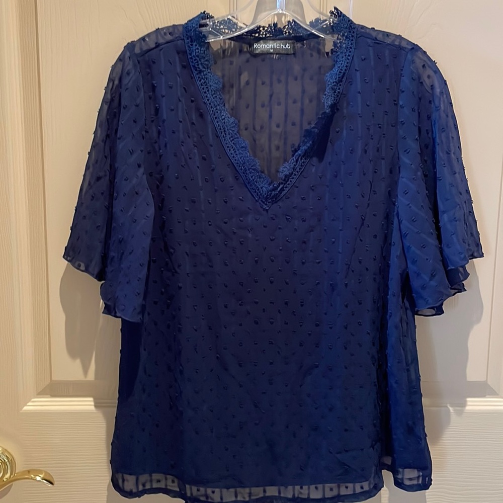 Navy textured V neck top with sheet back NWOT size M never worn.